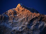 7 18 Makalu Summit Sunset From Makalu Base Camp South The last rays at sunset burns the Makalu Southwest Face summit area, seen from Makalu Base Camp South (4850m).